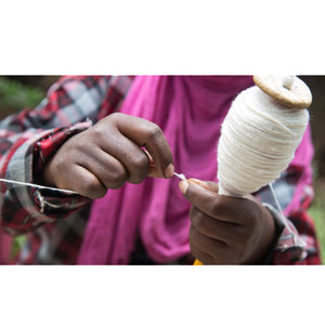 hand spinning Ethiopian cotton - Ethiopian traditional clothing
